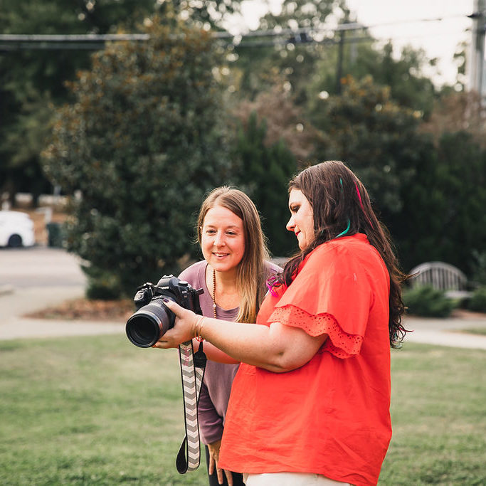 showing a client photos in back of camera